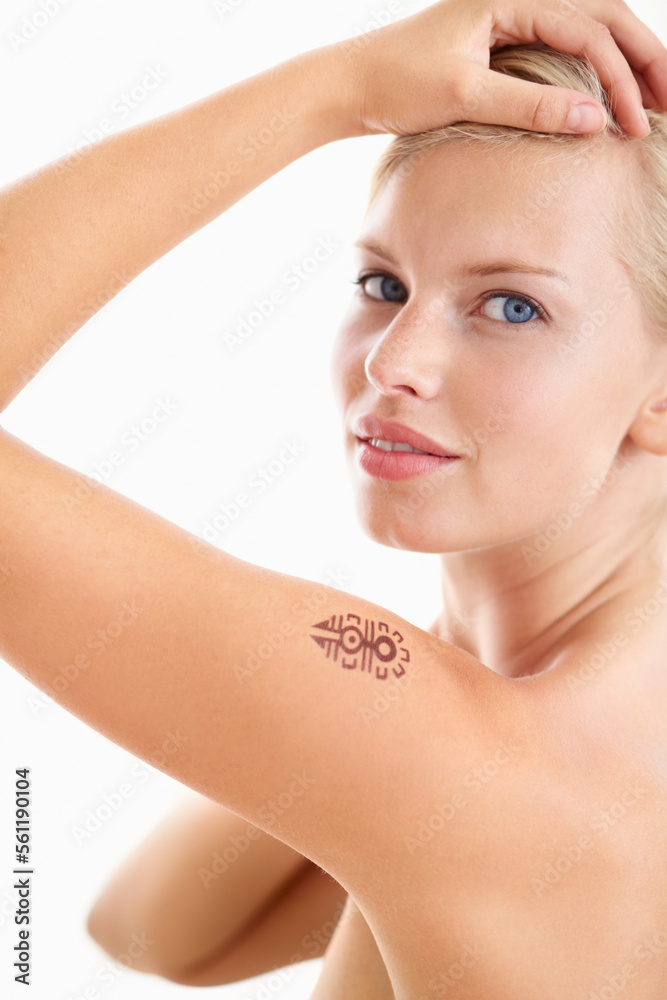 Beauty, portrait and woman with tattoo in studio for wellness against a white background space. Face