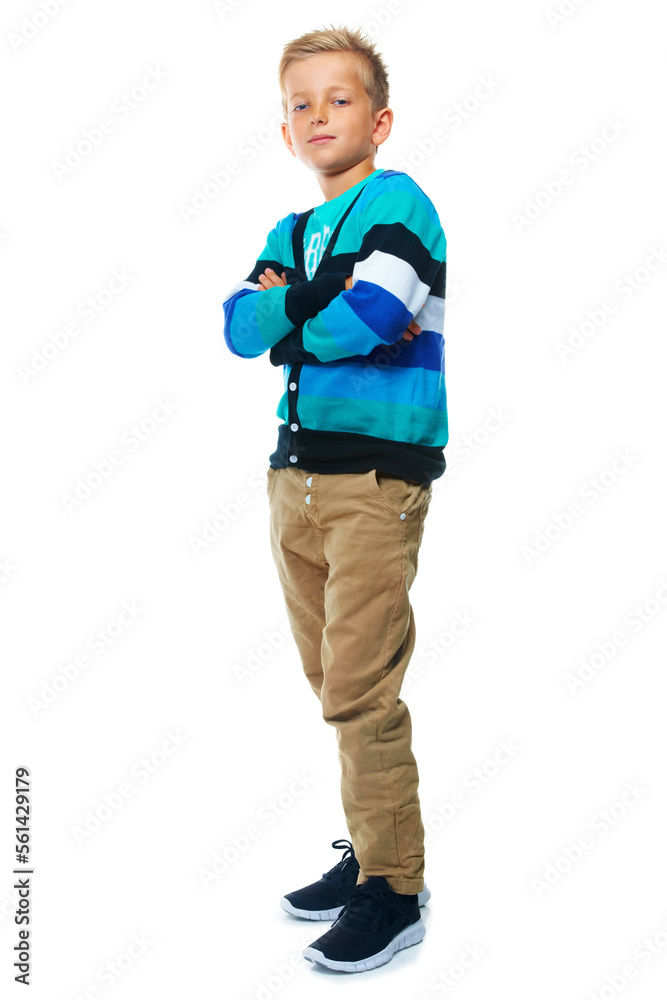 Fashion, youth and portrait of boy on a white background standing with crossed arms, trendy and casu