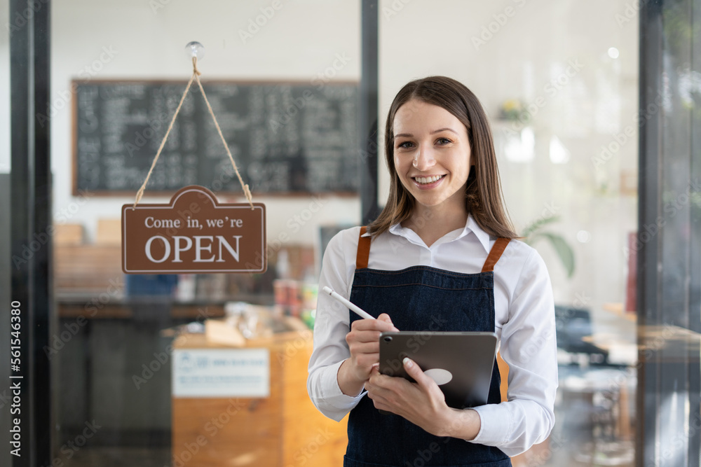 Opening a small business, Happy woman in an apron standing near a bar counter coffee shop, Small bus