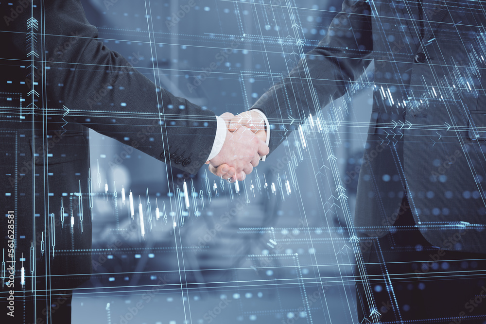 Close up of businessmen handshake with glowing candlestick forex grid chart on blurry office interio