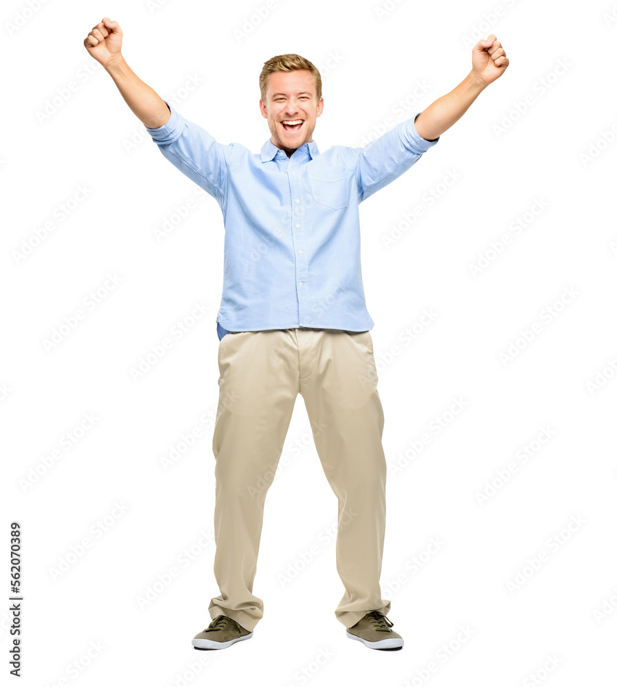 A handsome young man standing alone in the studio with his arms raised in celebration isolated on a 