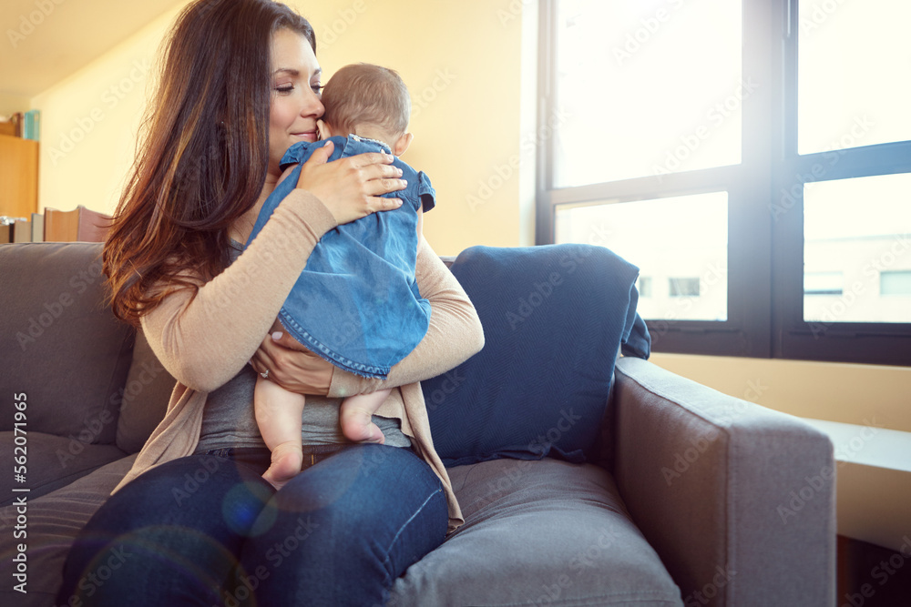 Mom, bonding and baby girl hug in house living room or family home sofa in support trust, love and s