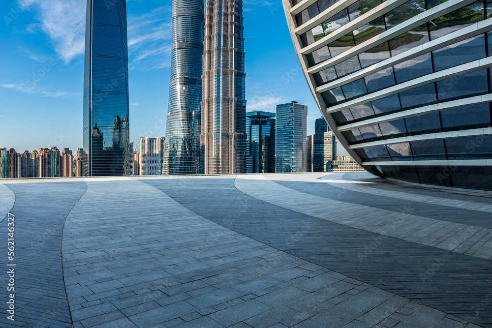 Empty square floor and city skyline with modern buildings in Shanghai, China.