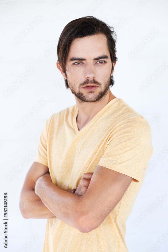 Man, vertical and thinking with casual fashion and arms crossed with isolated white background. Stud