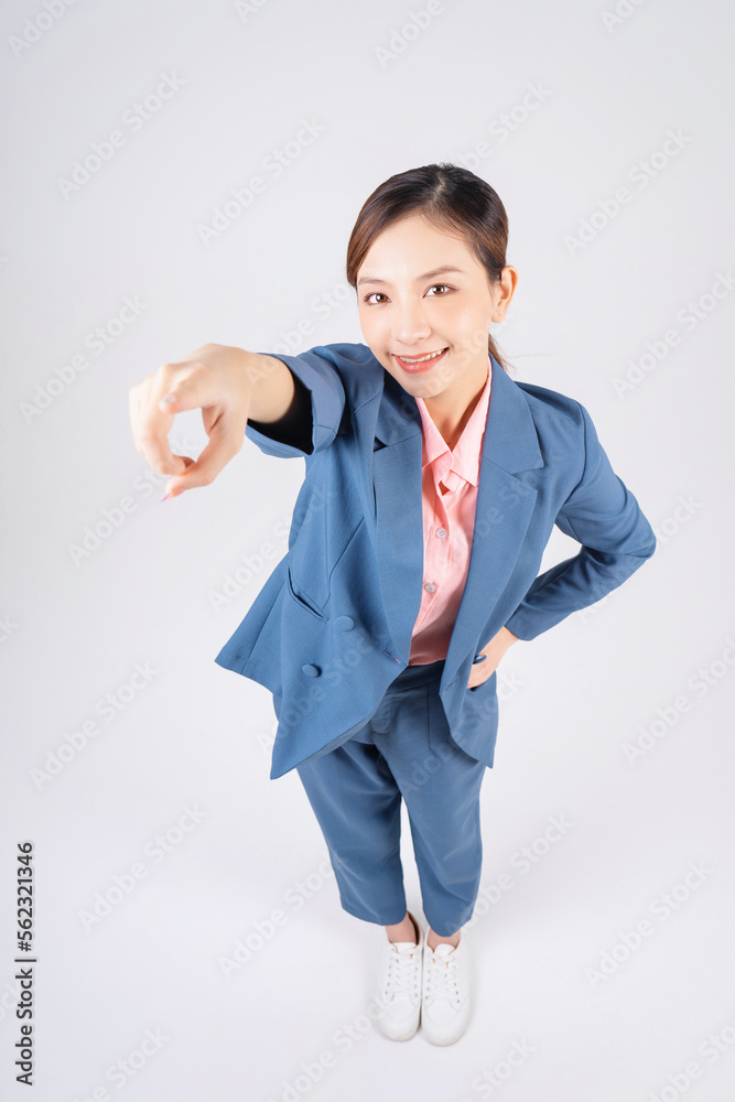 Full length image of young Asian businesswoman