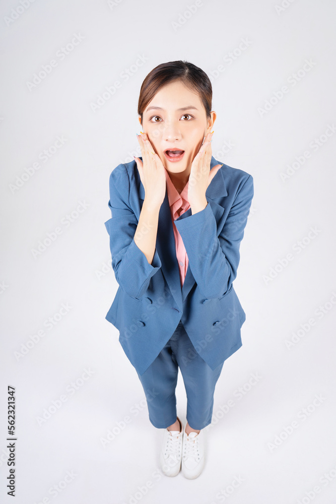 Full length image of young Asian businesswoman