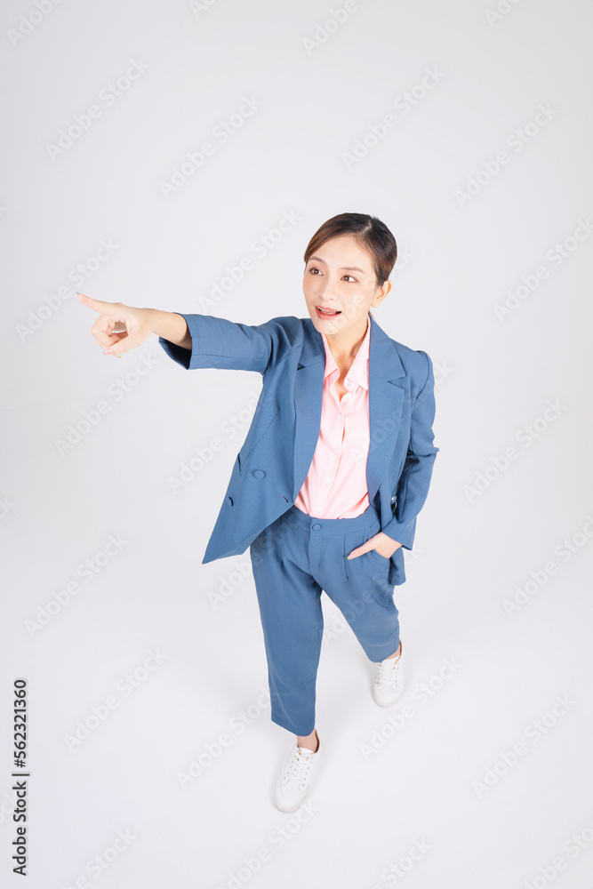 Full length image of young Asian businesswoman