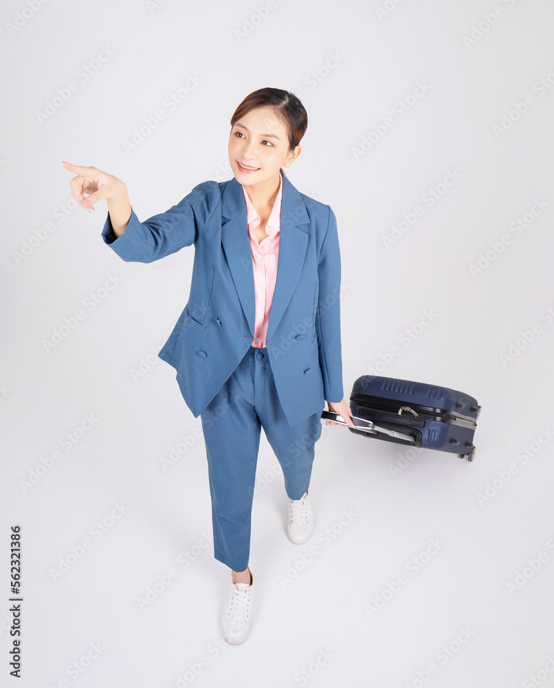 Image of young Asian businesswoman travel