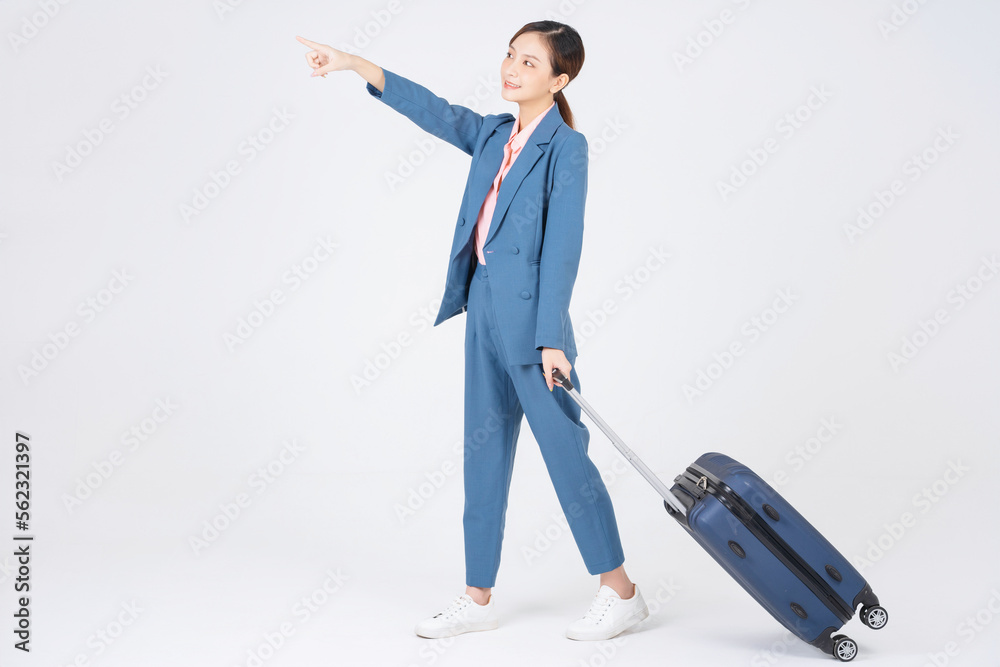 Image of young Asian businesswoman travel