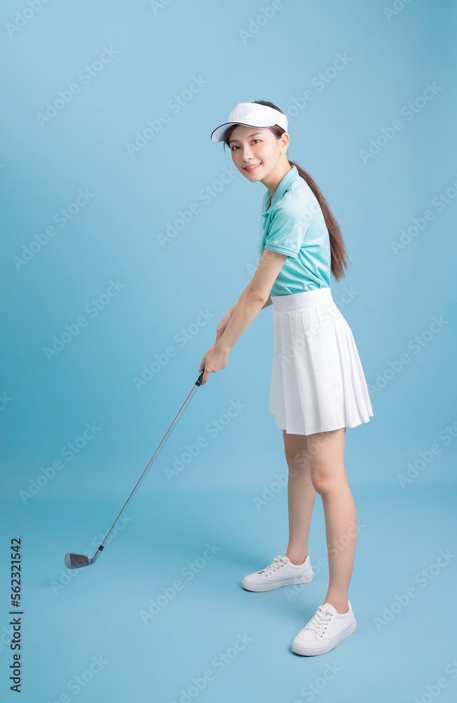 Image of young Asian female golfer