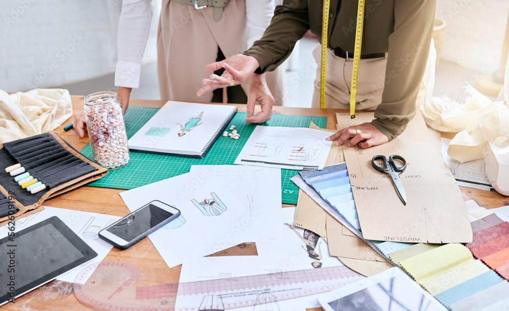 Planning, creative and fashion designer hands with teamwork, collaboration and textile workspace. Cr