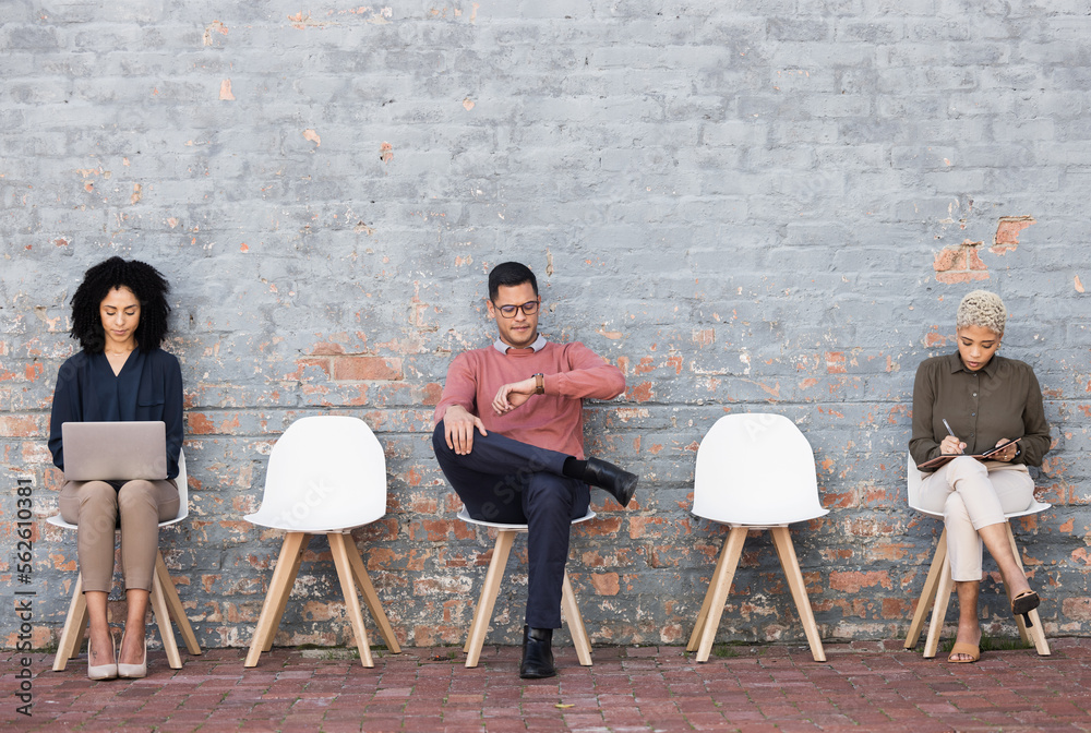 Business people, waiting room and sitting on chairs against brick wall for interview, meeting or opp