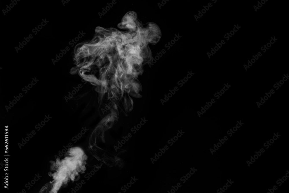 Close-up view of white water vapor with spray from the humidifier. Isolated on black background. ste