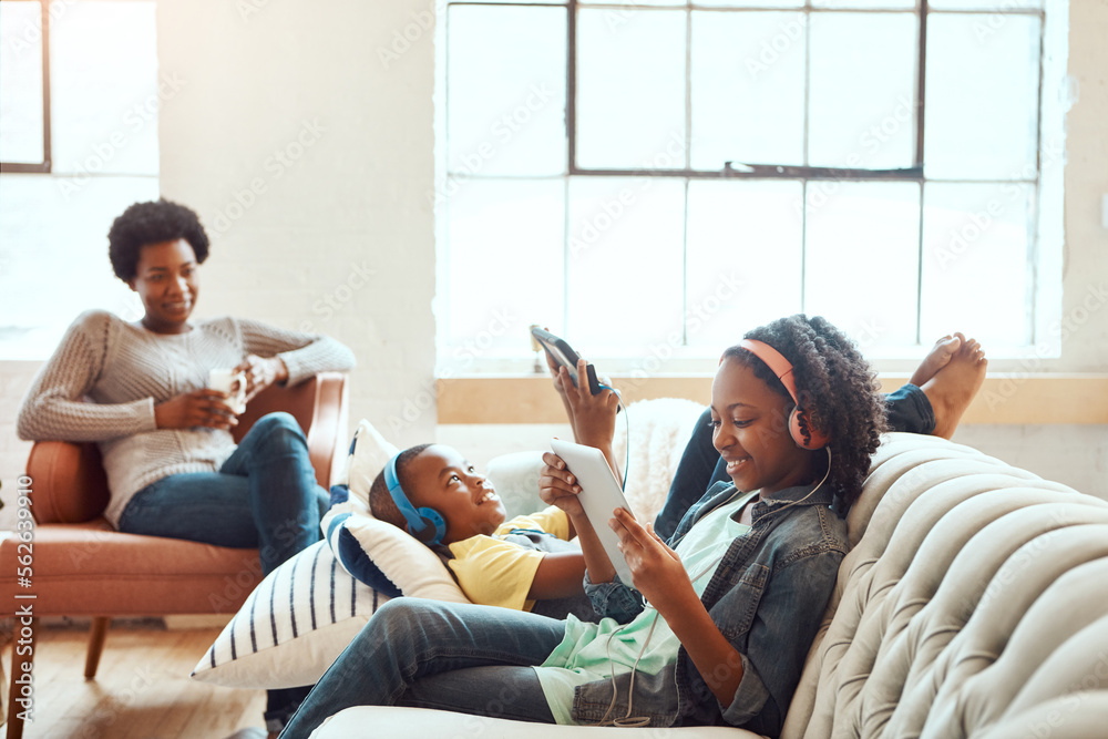 Tablet, relax and black family children, mother or African people relax together, bond and enjoy qua