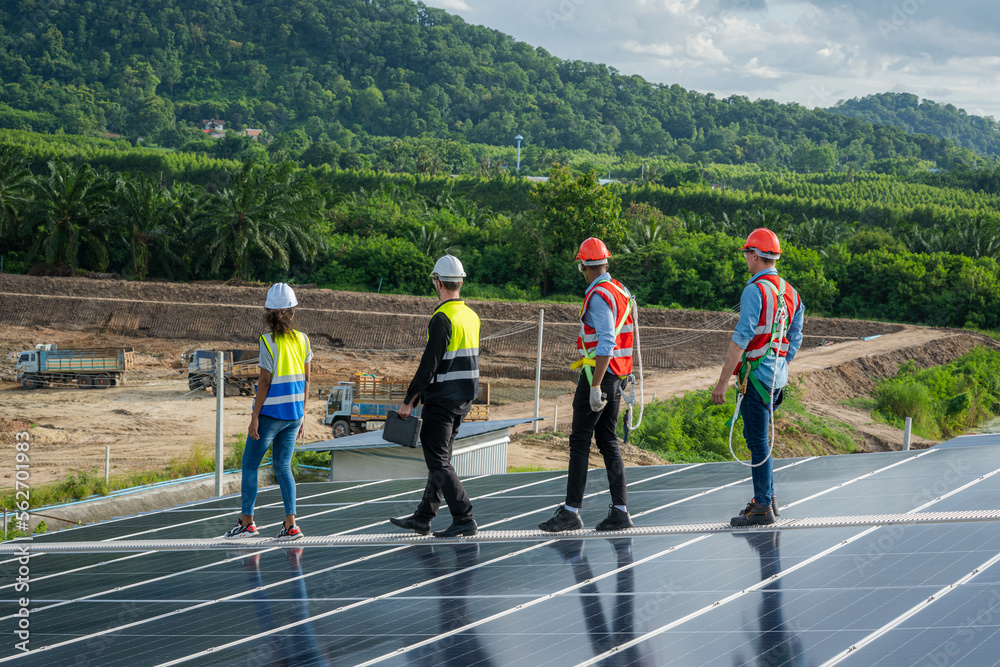 Engineer maintenance checking installing solar roof panel on the factory rooftop,Survey check solar 