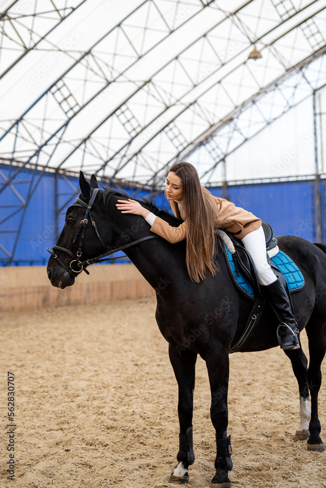 Horse riding pretty lady at the farm. Active lifestyle countryside horse ride.