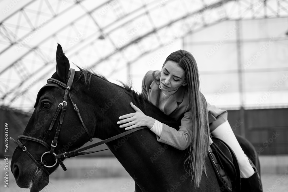 Horseriding woman on the ranch. Countryside lady on horseback riding.