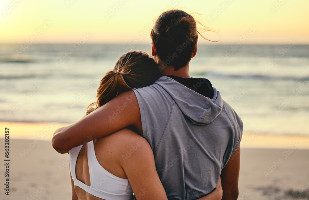 Hug, fitness and back of couple at the beach for sunset training, exercise and workout with a view. 