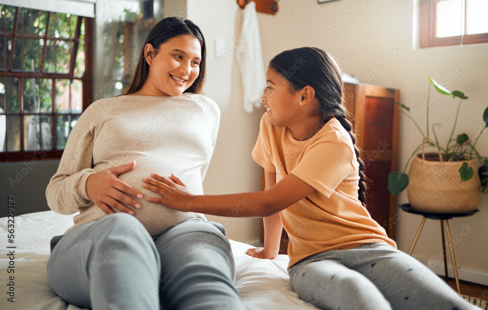 Happy, pregnant and mother with kid on bed for belly touch with excited, curious and joyful smile. I