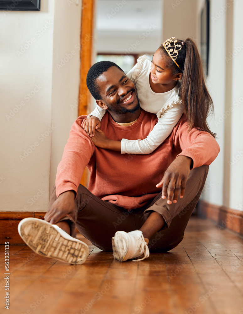 Family, father and daughter hug in their home, happy and relax while bonding and having fun. Love, b