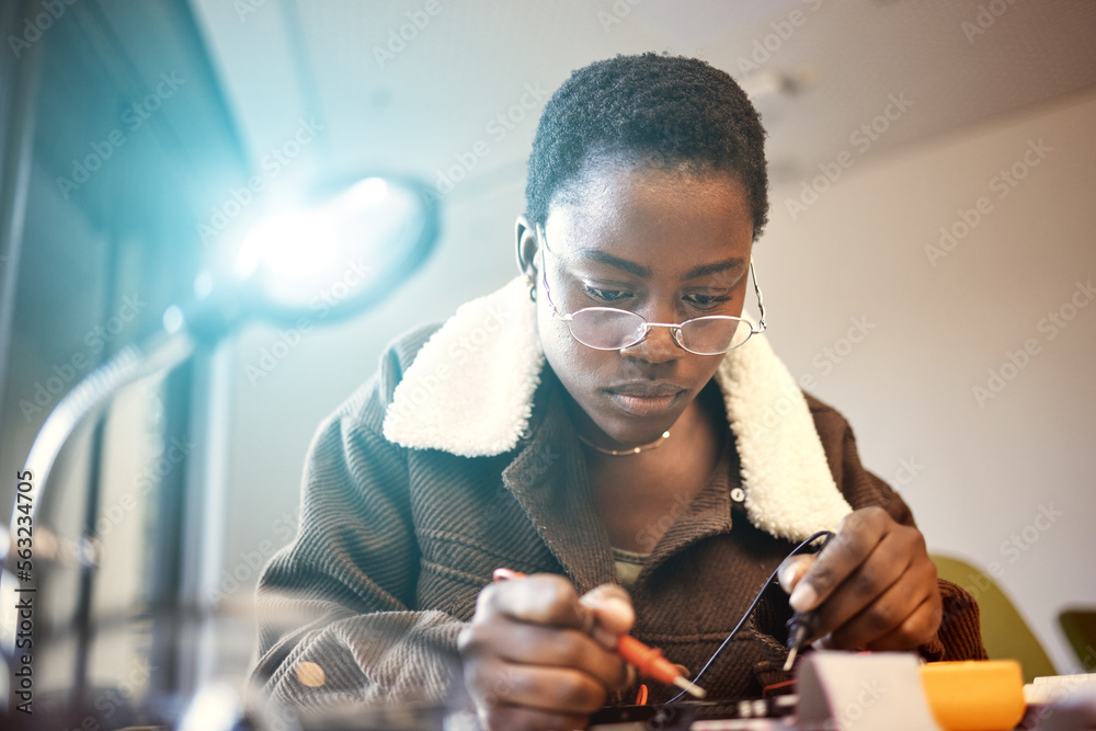 Black woman, student and engineer with electrical project while learning and studying. Education, en