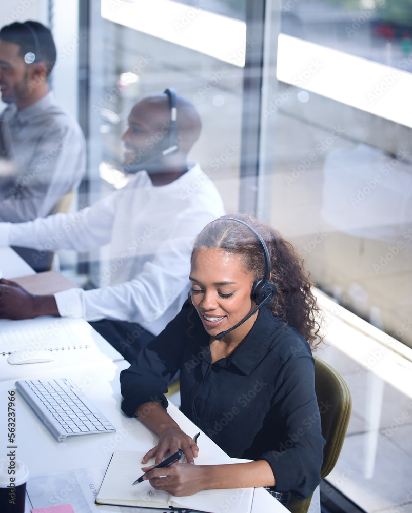 Call center, customer support with a happy black woman consultant working in her telemarketing offic