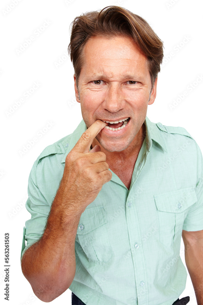 Portrait of a man biting his finger in studio with a nervous, worried or terrified facial expression