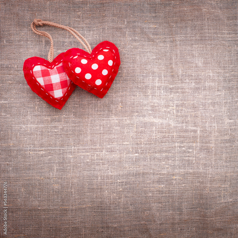 Love hearts on textile texture background. Valentines day card concept. Heart for Valentines Day Bac