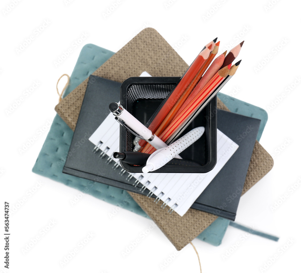 Stationery holder with notebooks on white background