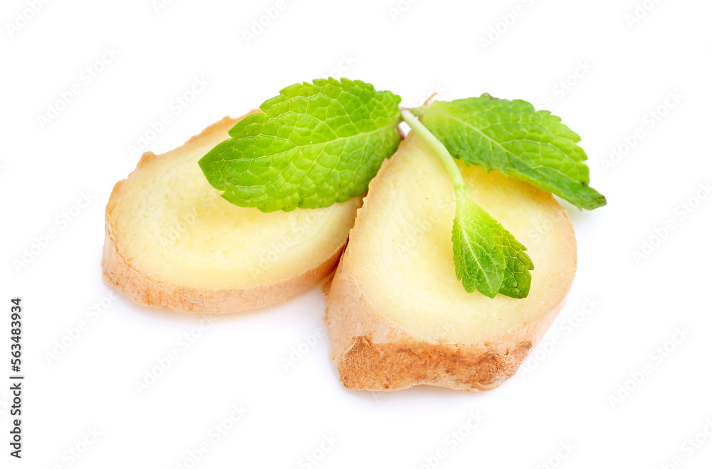 Fresh ginger slices with mint isolated on white background