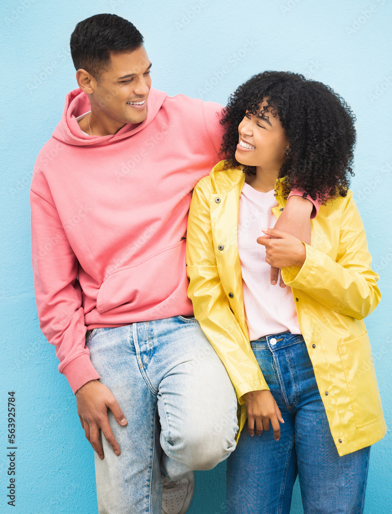 Couple of friends, bonding and hug on isolated blue background in fashion, afro hair trend and cool 