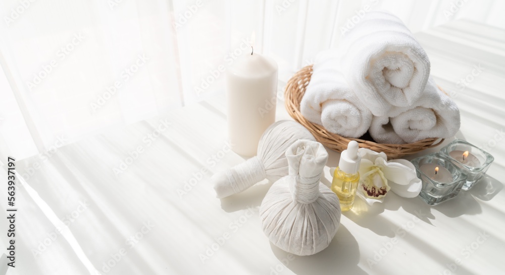 Spa accessory composition set in day spa hotel , beauty wellness center . Spa product are placed in 