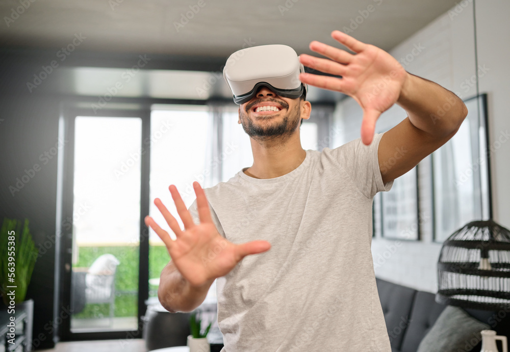 Technology, virtual reality and hands of man in home with headset for streaming interactive, online 