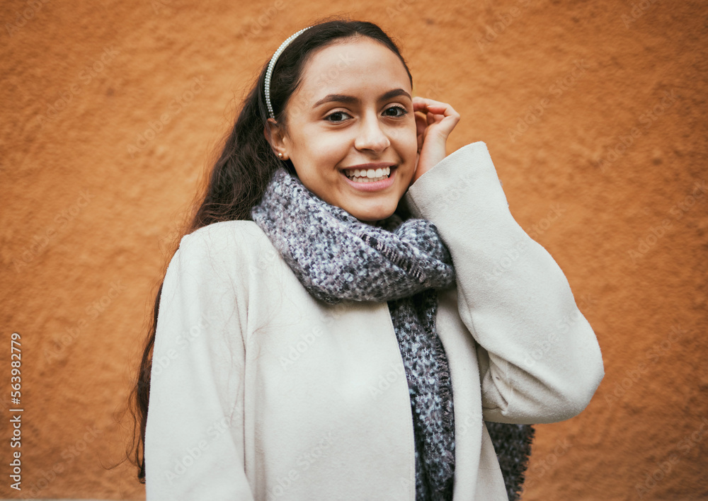 Happy woman, portrait or hair tuck behind ear by city wall, mockup background or brown mock up in Po