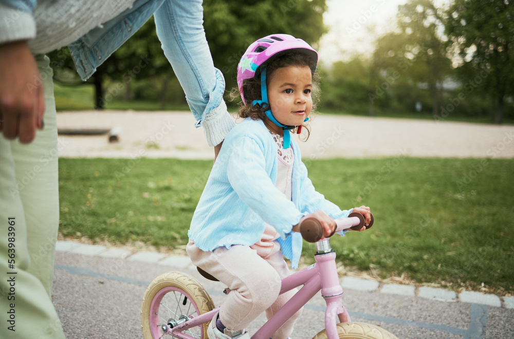 Mother, girl and learning with bike in street, road or park for love, bonding and happy on holiday. 