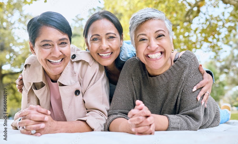 Portrait, family and sisters in a park with group of people, happy and laughing looking relax. Frien