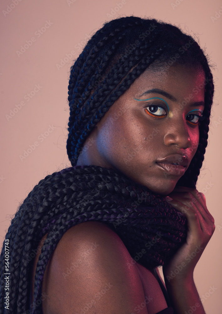 Portrait, hair and makeup with a model black woman in studio on a wall background for natural hairca