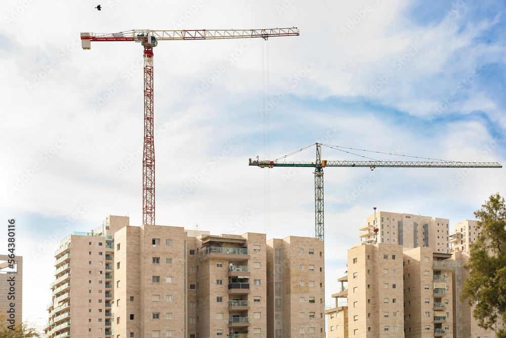 View of cranes on construction site