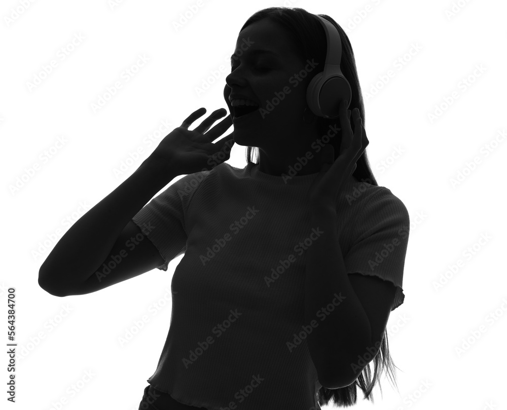 Silhouette of young woman in headphones on white background, closeup