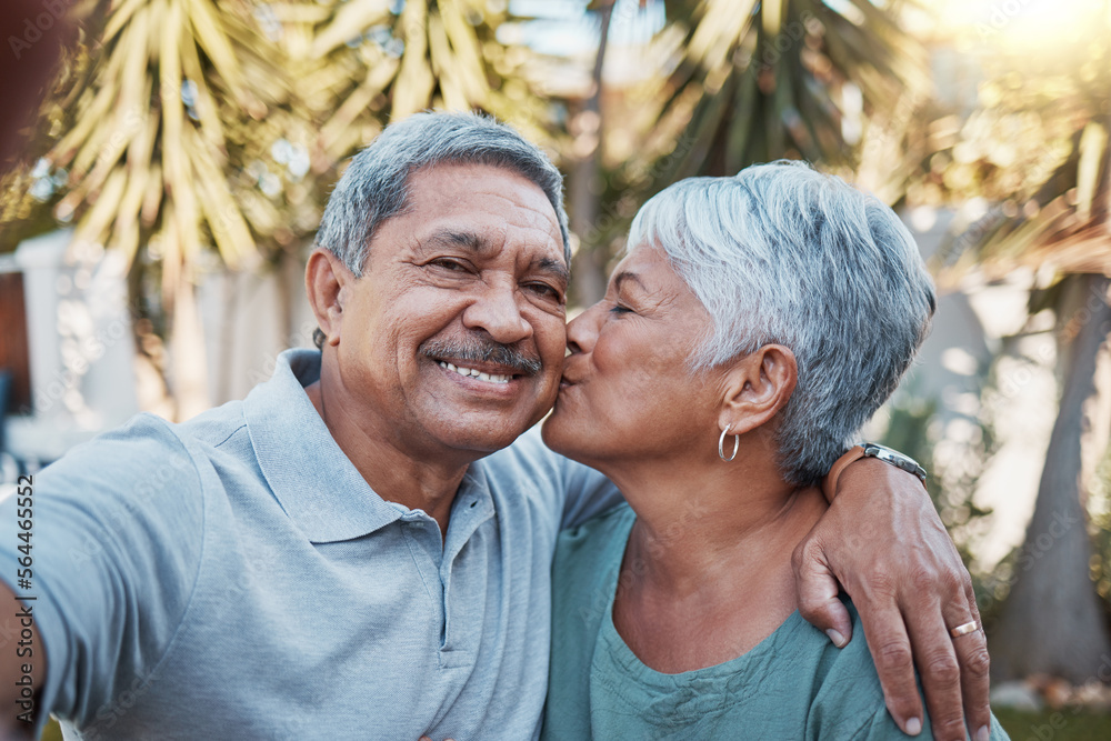 Senior couple, selfie and kiss outdoor portrait with love, happiness and care with a smile in garden