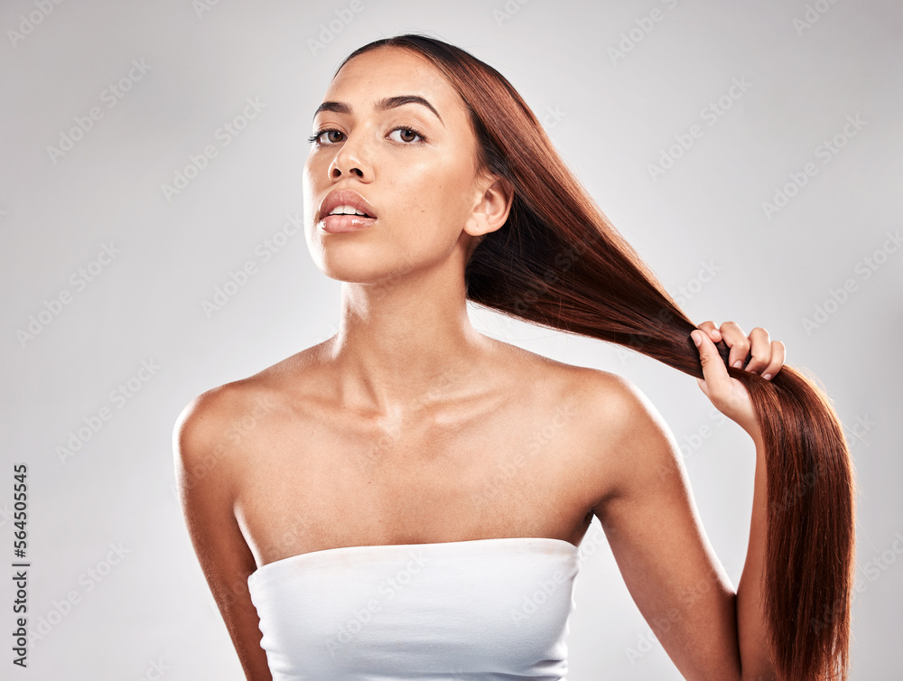 Portrait, healthy hair and woman in studio for beauty, salon treatment and care on grey background. 