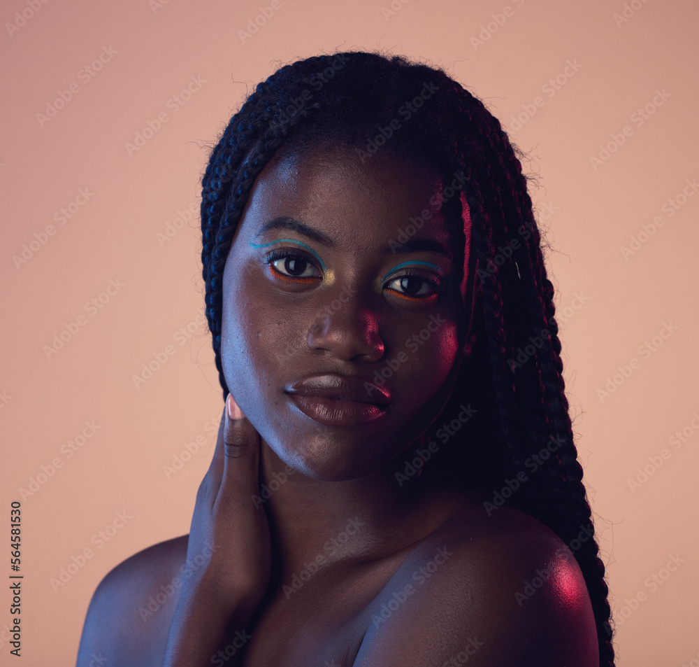 Portrait, hair and beauty with a model black woman in studio on a wall background for natural hairca