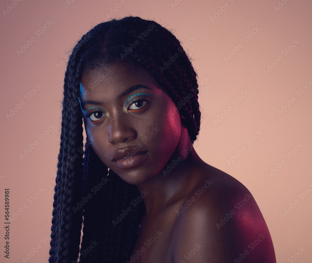 Portrait, face and hair with a model black woman in studio on a wall background for natural haircare