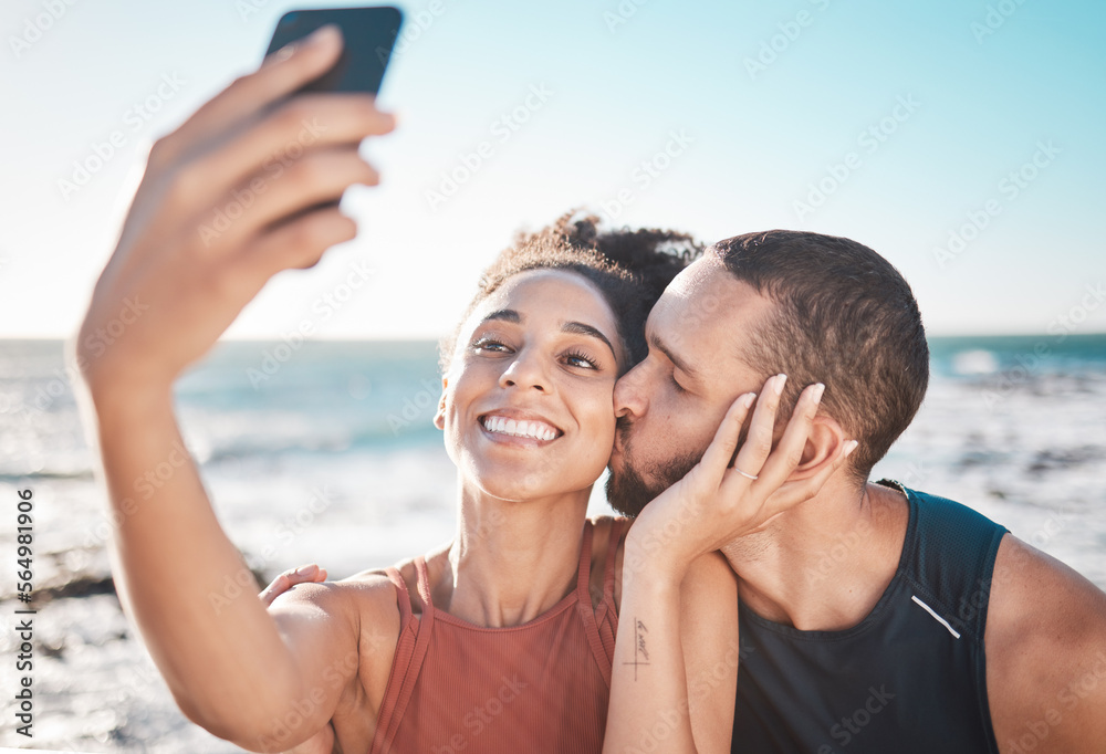 Selfie kiss, love and couple with a phone for streaming, training and care at the beach in Bali. Gra