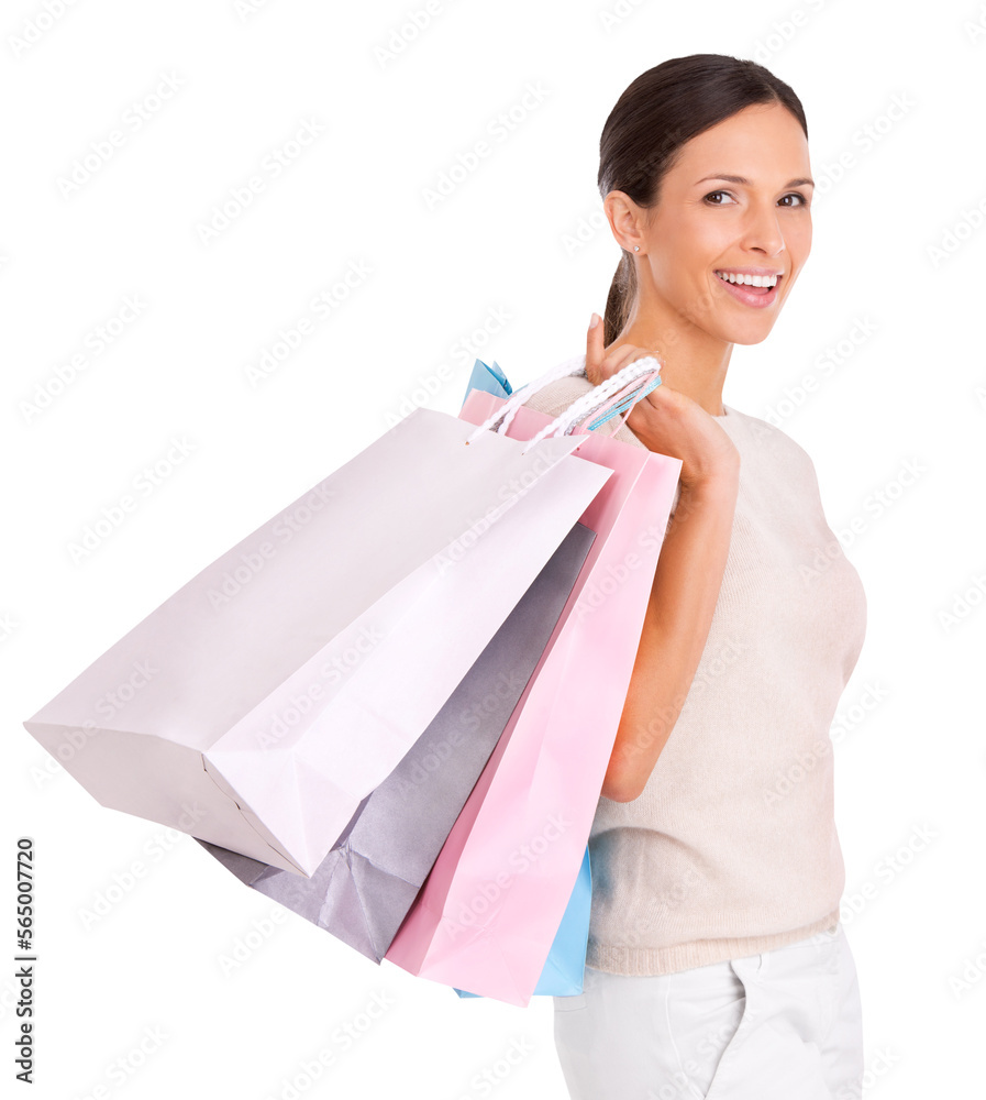 An attractive young woman carrying shopping bags over her shoulder and looking at the camera isolate