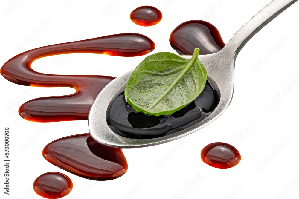 Balsamic sauce in spoon isolated 