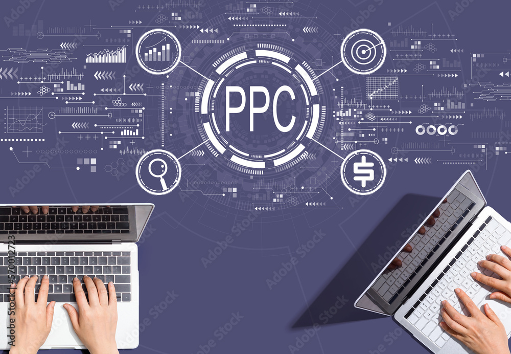 PPC - Pay per click concept with people working together with laptop computers