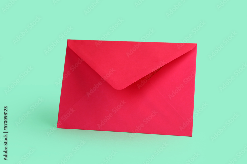 Red paper envelope on green background