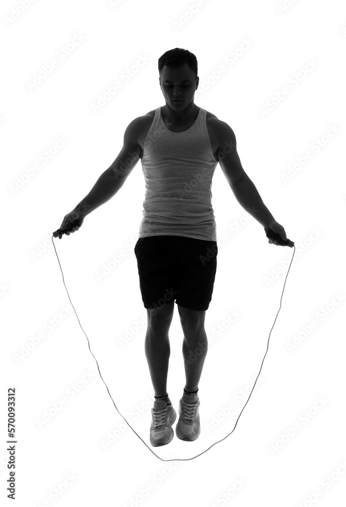 Silhouette of young man jumping with rope on white background