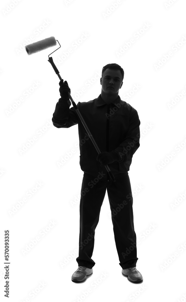 Silhouette of young decorator with paint roller on white background